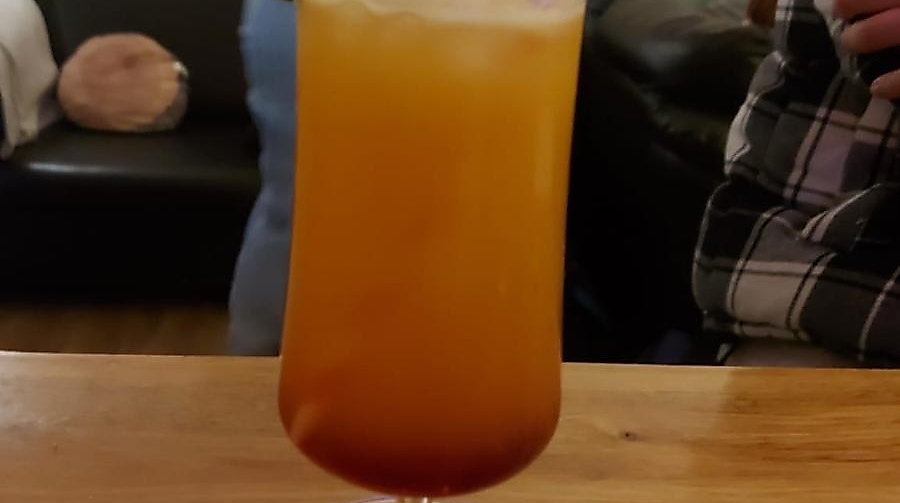 A mocktail sits on the counter of the youth café.