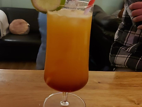 A mocktail sits on the counter of the youth café.