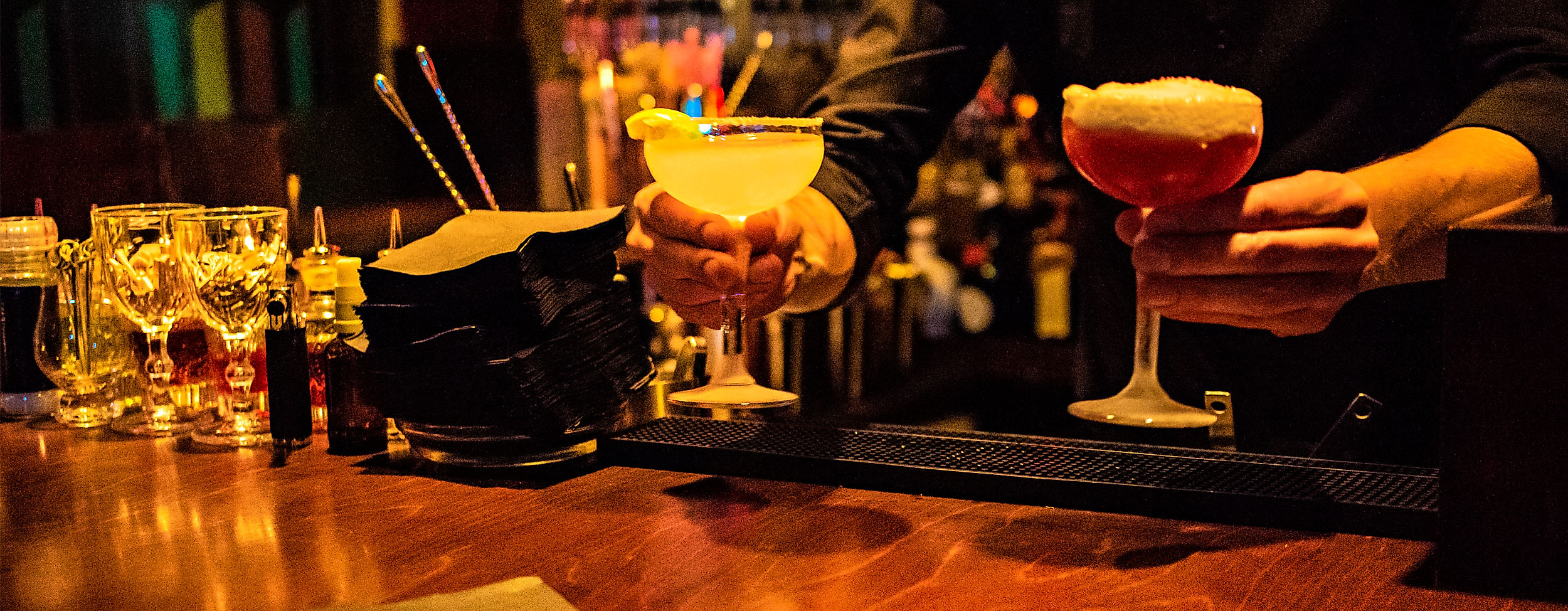 Bartender with cocktails